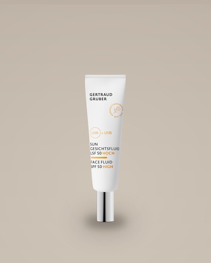 Sun Gesichtsfluid LSF 50 von Gertraud Gruber, weiße Tube mit Chromkappe